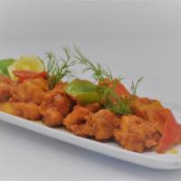 CHILLI CHICKEN · This most popular Indo-Chinese spicy food is marinated with spices, deep fried and cooked on...