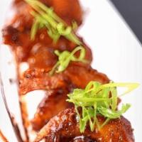 CHILLI SHRIMP · This most popular Indo-Chinese spicy food is marinated with spices, deep fried and cooked on...