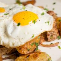 Potato Hash · House-made fennel sausage / roasted potato / red onion / two organic sunny side eggs