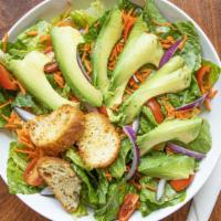 Garden Salad · Romaine, carrot, tomato, onion, avocado, herb croutons and your choice of dressing.