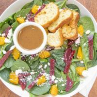 Beets Spinach Salad · Baby spinach, beets, oranges, feta cheese, herb croutons and vinaigrette dressing.