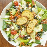 Greek Salad · Spinach, romaine, onion, tomato, carrot, feta, cucumber, olives, vinaigrette dressing.