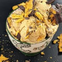 Peanut Butter Honeycomb Crunch · Peanut Butter ice cream studded with chocolate covered honeycomb pieces made by Petite La Fl...