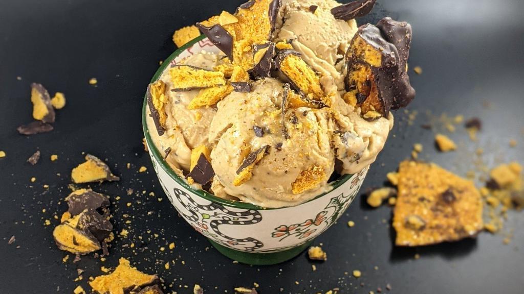 Peanut Butter Honeycomb Crunch · Peanut Butter ice cream studded with chocolate covered honeycomb pieces made by Petite La Fleur! Nutty, creamy, crunchy, and chocolatey all in one bite!