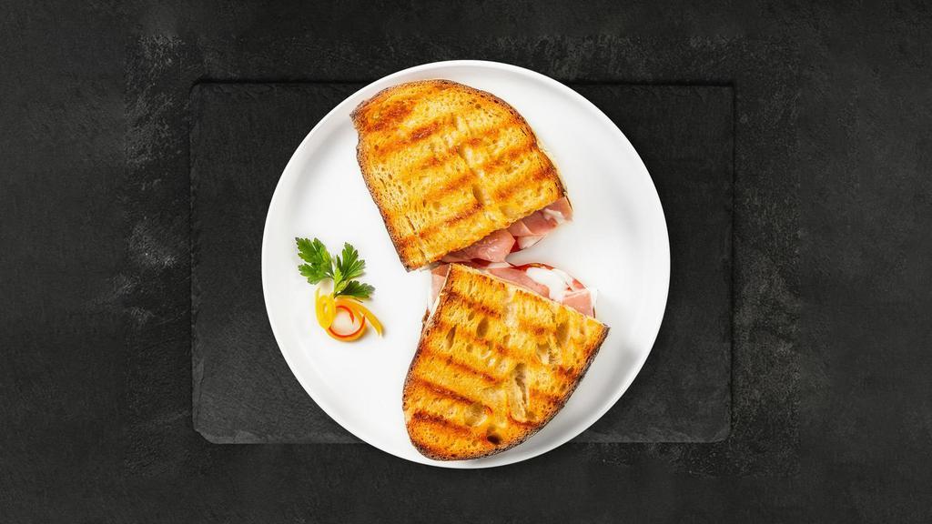 Talkin' Turkey Panini · Roasted turkey, pepper jack cheese, tomatoes, garlic pepper sauce served on your choice of bread.