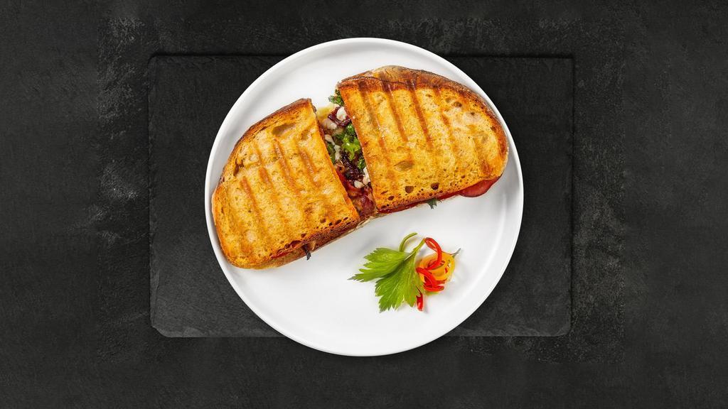 BLT Basics · Cardamom candied bacon, Butter lettuce, Arugula, Tomato, Lemon aioli served on your choice of bread.