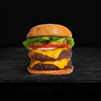 Double Trouble Cheese Burger · Two American beef patties topped with melted cheese, lettuce, tomato, onion, and pickles. Se...