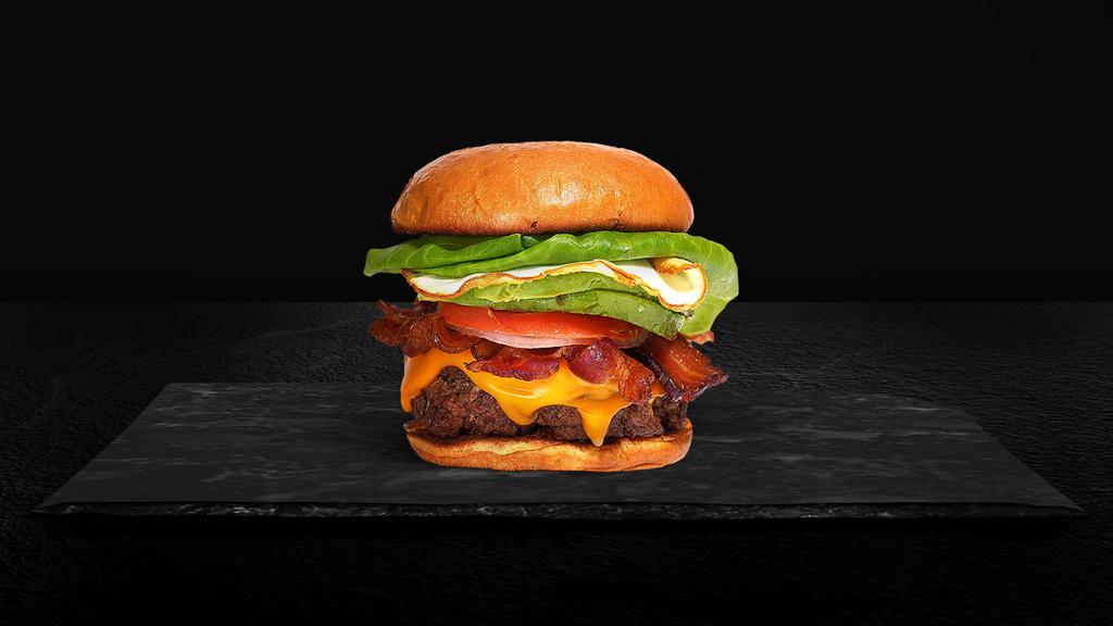 Good Morning Burger · American beef patty topped with bacon, fried egg, avocado, melted cheese, lettuce, tomato, onion, and pickles. Served on a warm bun.