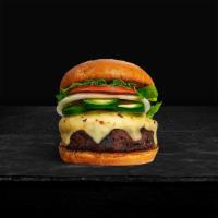 Jolly Jalapeno Burger · American beef patty topped with melted cheese, jalapenos, lettuce, tomato, onion, and pickle...