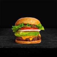 Corporal Cado Burger · American beef patty topped with avocado, melted cheese, lettuce, tomato, onion, and pickles....