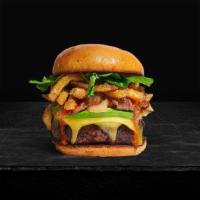 Fries And Ties Burger · American beef patty topped with fries, avocado, caramelized onions, ketchup, lettuce, tomato...