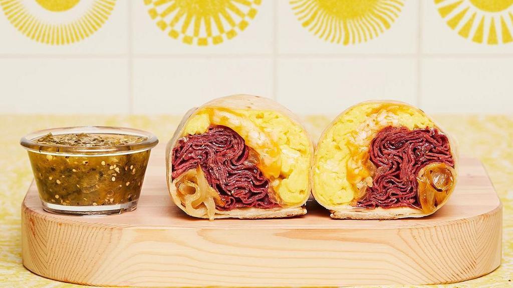 New York Breakfast Burrito · Two scrambled eggs, breakfast potatoes, pastrami, caramelized onions, and melted cheese wrapped in a fresh flour tortilla.