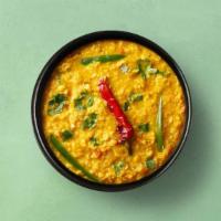 Tempered Yellow Lentils · Slow-cooked lentils, tempered with flash-fried whole spices, garnished with fresh cilantro. ...