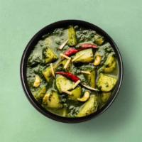 Potato Spinach Supreme · Potatoes and puréed spinach cooked with Indian spices, onions, and tomatoes with a homely ta...