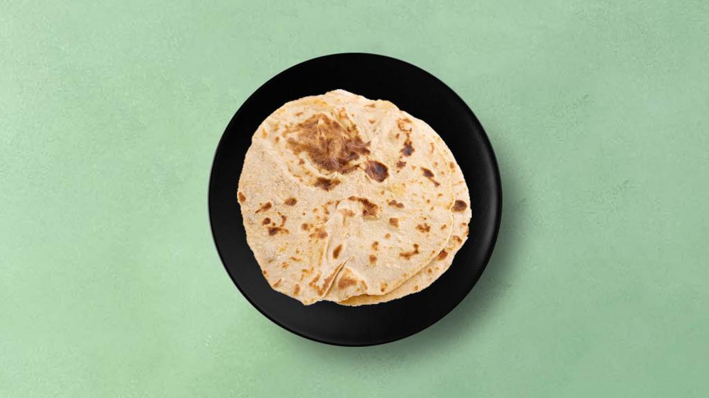 Chapati · Whole wheat flat bread baked to perfection over a flat griddle.