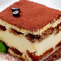 Tiramisu Big Ladyfinger · Layers of espresso dreched ladyfingers seperated by mascarpone cream and dusted with cocoa p...