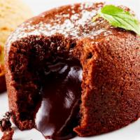 Chocolate Souffle · Moist chocolate cake with a heart of creamy rich chocolate. (for best results throw in the o...