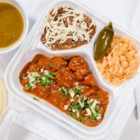 Pork with red sauce · Pork in red sauce with rice and beans