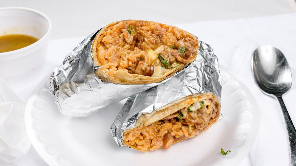 Barbacoa regular burrito · Beef barbacoa with
rice , beans , onion ,cilantro , sauce
Avocado extra $1.00