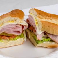 Ham sandwich · Ham in soft roll with
tomato ,cheese (swiss), lettuce , onion , mayo , mustard , pickle
Avoc...