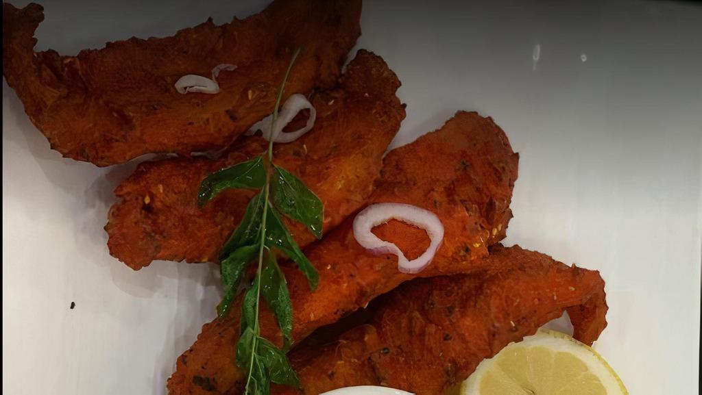 Amritsari Fish · Fish napped in the batter of gram flour deep fried to crisp perfection.