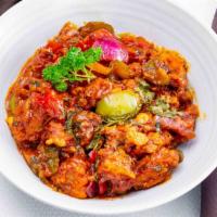 Chilly Chicken (Jalandhari Special) · Boneless chicken, pepper, sliced onion and Goan sun dried chilies tossed with tomatoes and s...