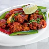 Chicken Tikka KABAB (Boneless) · Tender morsels pieces of chicken breast marinated in a yogurt and home ground spices and bak...