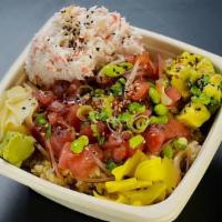 Fresh Tuna Poke Rice Bowl · Tuna sashimi, crab, edamame, red onion, green onion, poke sauce, pickled radish, avocado, wa...