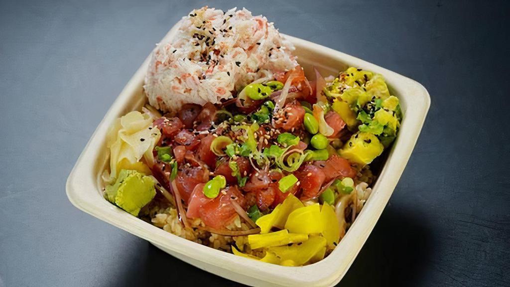 Fresh Tuna Poke Rice Bowl · Tuna sashimi, crab, edamame, red onion, green onion, poke sauce, pickled radish, avocado, wasabi, ginger, sesame, and choice of rice or six green salad.
