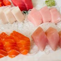 #1. Assorted Sashimi (15 Pcs) · Raw fish assortment.
