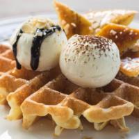 Affogato Waffle · Rolled vanilla ice cream with a hot espresso pour over. Served with a choice of fresh waffle.