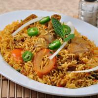 Chicken Biryani · Stir fried rice with chicken and special blend of spices.