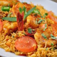Prawn Biryani · Stir fried rice with tiger prawns and special blend of spices.