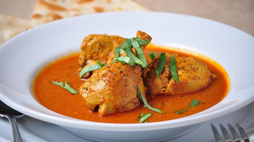 Chicken Curry · Chicken cooked in a traditional blend of curry spices.