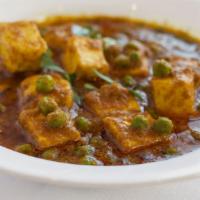 Mutter Paneer · Green peas cooked with home made cheese.