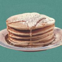 Classic Pannies · 2 fluffy pancakes served with maple syrup, butter, and dusted with powdered sugar.