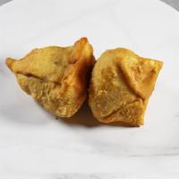 Samosa (2 pieces) with Chutneys · 2 Fried patty shells stuffed with roasted Cumin & Potatoes. 
Served with 1 oz Chutneys Mint ...