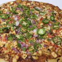 Paneer Masala Pizza · Paneer Sauce with Paneer,  Bell pepper, Onions, Tomatoes, Jalapeños, and Mozzarella cheese.