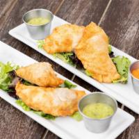 Chicken Empanadas · 2 Chicken Empanadas stuffed with Mary's Chicken, Onions, Peppers and Spices. Served with Chi...
