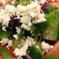 Greek Salad. · romaine, cherry tomatoes, red onion, peppers, cucumber, olives, feta cheese, croutons, herb-...