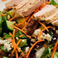 House Salad. · mixed greens, carrots, tomato, cucumber, candied walnuts, blue cheese crumbles, house vinaig...