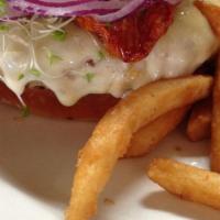 Turkey Burger. · ground turkey, melted Swiss, sprouts, tomato, red onion, sriracha aioli with fries & salad