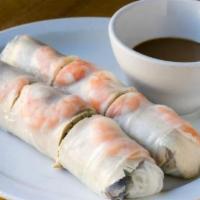 Spring Rolls · Poached pork and shrimp, vermicelli, mint, and peanut dipping sauce.