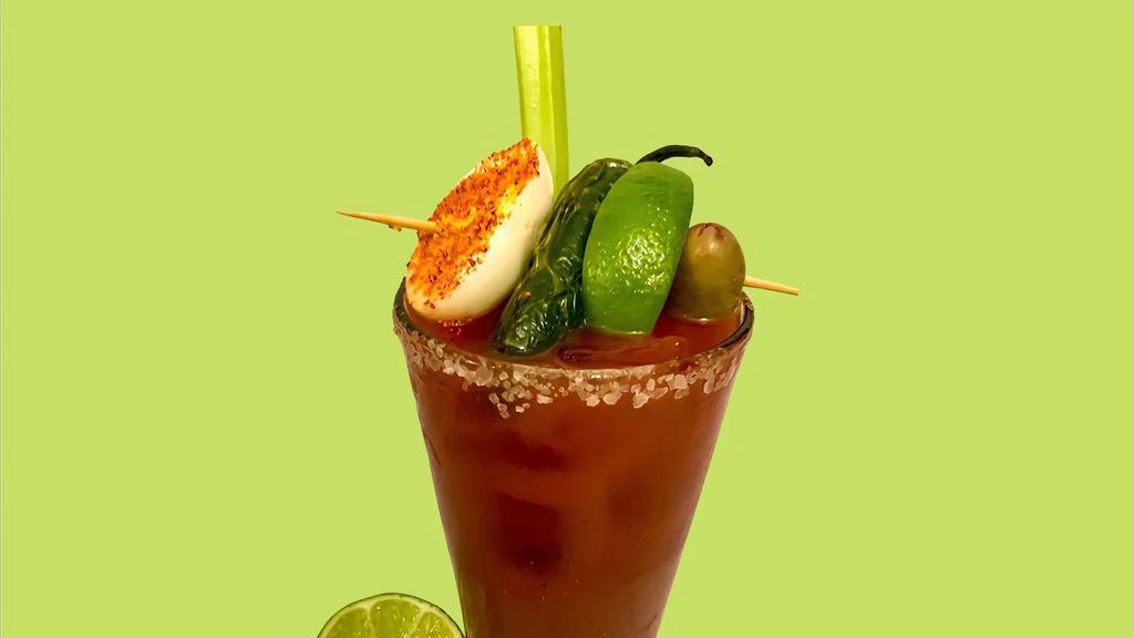 Virgin E&M Signature Bloody Mary · Hard boiled egg with tajin chili-lime seasoning, grilled jalapeño, lime, and olives.   Just add vodka!  Add 1.5 oz of your own vodka for singles, or 7.5 oz for party kits.