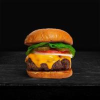 Cheesin' Cheese Burger · American beef patty topped with melted cheese, lettuce, tomato, onion, and pickles. Served o...