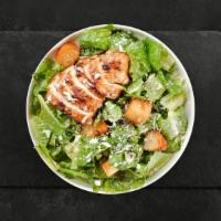 Romaine Dictator Salad · Romaine lettuce, house croutons, and parmesan cheese tossed with Caesar dressing.
