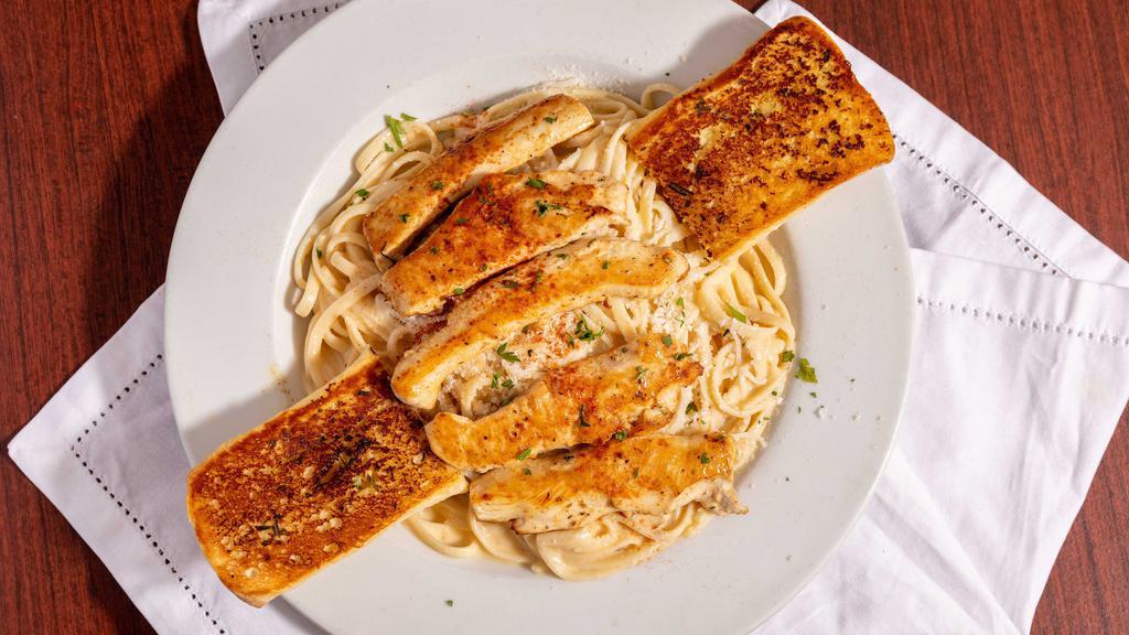 Fettuccine Alfredo With Chicken · Fettuccine pasta mixed with our own alfredo sauce.