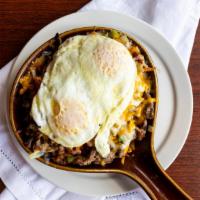 Country Fried Steak Skillet · Country fried steak topped w/ Country Potatoes, Country Gravy and Two Eggs
