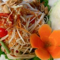 A03. Papaya Salad · shredded green papaya with tomatoes, green beans, ground peanut, dry shrimps in spicy lime d...