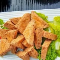 A15. Crispy Tofu · fried tofu served with sweet & chili sauce with ground peanuts.